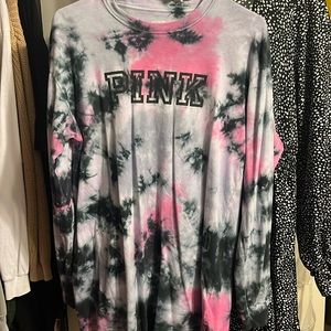 A tie-dye pink shirt